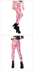 Detailed view of pink Christmas leggings featuring snowflakes and candy cane prints