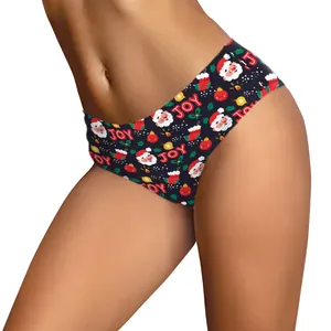 Women's mid-rise Christmas panties featuring Santa and JOY prints on a navy blue base