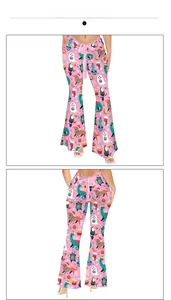 Vue avant et arrière du legging évasé rose avec dinosaures et motifs de Noël