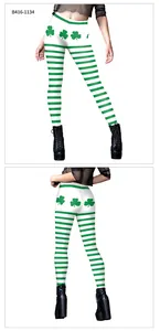 Detail view of St. Patrick's Day leggings with green stripes and shamrock pattern print