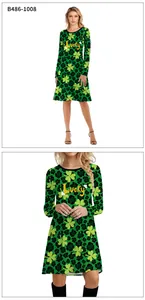 Detail view of long sleeve St. Patrick's Day dress with Lucky lettering and clover print
