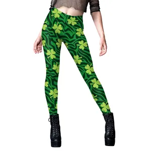 Women's green St. Patrick's Day leggings with shamrock prints and wavy pattern