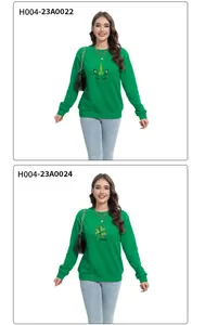Détail de sweats verts de la Saint-Patrick avec imprimés trèfles et texte lucky
