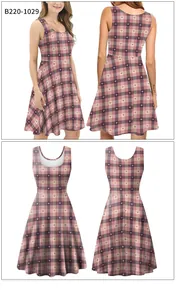 Detail view of pink plaid sleeveless dress with purple heart pattern and A-line cut