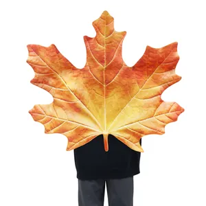 Giant maple leaf shaped plush pillow with realistic orange gradient and leaf veins
