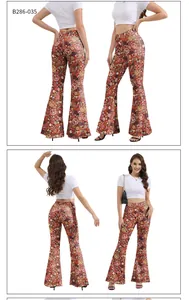 Detail of high waist flared pants featuring vintage peace sign and floral prints