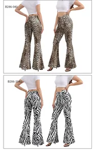 Detail view of high-waisted flared pants in trendy leopard and zebra animal prints