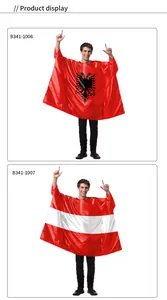 Detail view of festival hooded capes with Albania and Austria national flag designs