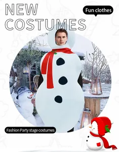Detail of adult snowman costume with red scarf and black buttons in snowy garden setting