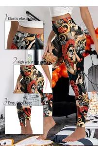 Detail of high waist leggings with Day of the Dead sugar skull and red rose prints