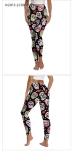Detail view of Halloween yoga leggings with colorful sugar skull and floral digital print