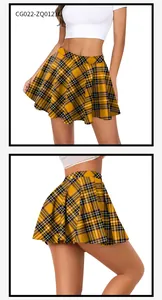 Detail view of yellow plaid pleated mini skirt with classic British tartan check pattern