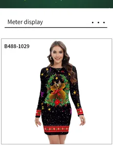 Detail of Christmas dress featuring reindeer and snowflake prints with long sleeves