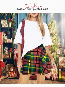 Close-up of red and green plaid pleated skirt with festive Christmas tartan pattern