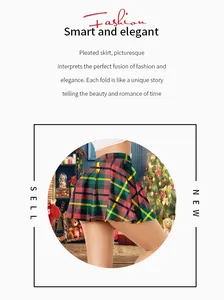 Detail of red plaid pleated Christmas skirt featuring festive patterns and high waist cut