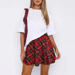 Women's pleated mini skirt in red plaid pattern with classic schoolgirl style