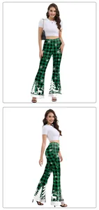 Detail view of high-waisted Christmas flare pants with snowflake and reindeer patterns