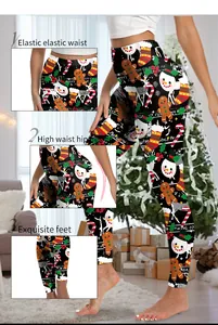 Dettagli dei leggins natalizi a vita alta con motivi di pupazzo di neve e omino di pan di zenzero
