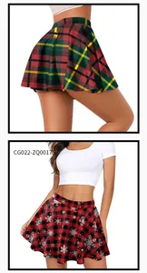 Detail of red plaid pleated skirt and white snowflake print Christmas skater skirt