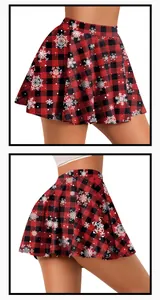 Close-up of red and black buffalo plaid A-line skirt with white snowflake patterns