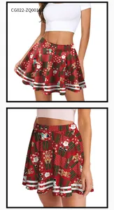 Detailed view of Christmas pleated skirt with Santa, reindeer and snowflake print