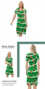 Detail of Christmas dress with candy cane print and irregular jagged hemline