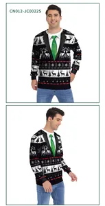 Close-up of Christmas sweatshirt showing snowflake patterns and tuxedo tie print detail