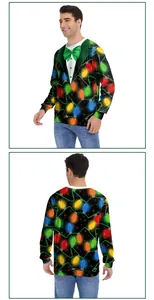 Detail of Christmas sweatshirt with tuxedo print and colorful festive light bulbs pattern