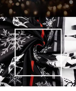 Close-up of 180G milk silk wool fabric with Christmas snowflake and geometric patterns