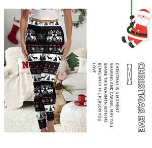 Close-up of Christmas leggings with reindeer and snowflake patterns in home setting