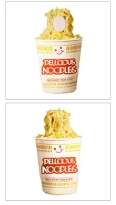 Detailed view of the 3D instant noodle cup phone grip stand with red lettering and yellow noodles