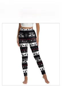 Detail of Christmas leggings featuring reindeer, snowflake prints and Merry Christmas text