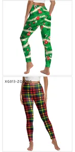 Close-up of Christmas yoga leggings with tree pattern and classic red green plaid prints
