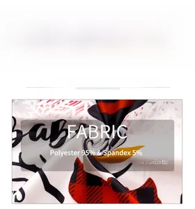 Détail de la texture du gilet de Noël en mélange 95% polyester et 5% élasthanne