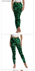 Detail view of St. Patrick's Day leggings with green clover and horseshoe digital print