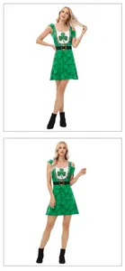 Detail of St. Patrick's Day dress featuring clover prints and green sequin shamrock