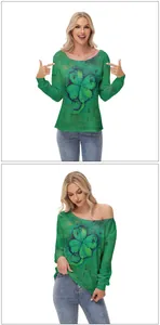 Close-up of Saint Patrick's Day off-shoulder top featuring vintage clover graphic print