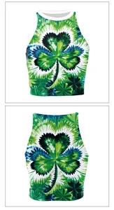 Detailed front and back view of green shamrock print crop top with white piping trim