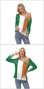 Detail of off-shoulder long sleeve top with Irish flag colors and shamrock print