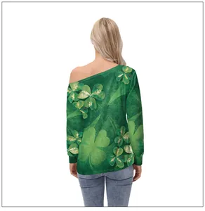 Detail of St. Patrick's Day off-shoulder top with green clover print from the back view