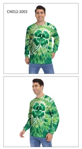 Detail of green tie-dye sweatshirt featuring a liquid drip shamrock print for St. Patrick's Day