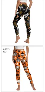 Détail de leggings de yoga Halloween à taille haute avec imprimés citrouille et crâne