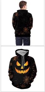 Detail of Halloween hoodie showing orange spider webs and pumpkin face print