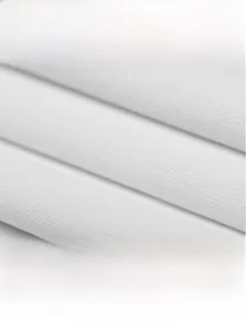 Macro view of breathable white knitted fabric showing fine texture and durability
