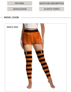 Close-up of Halloween yoga leggings with orange stripes and ghost print waistband