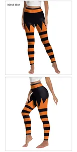 Detail view of high-waisted Halloween leggings with orange and black ghost stripes