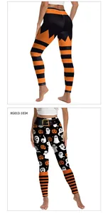 Macro shot of Halloween yoga leggings featuring ghost and orange stripe digital print details
