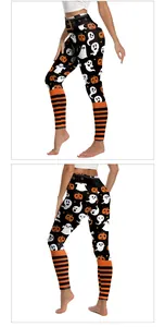 Detail view of Halloween leggings featuring ghost and pumpkin prints with striped legs