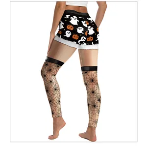 Detail of Halloween leggings with ghost prints, pumpkin motifs and spider web patterns