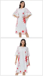 Detailed view of bloody white medical costume with splatter prints for Halloween parties